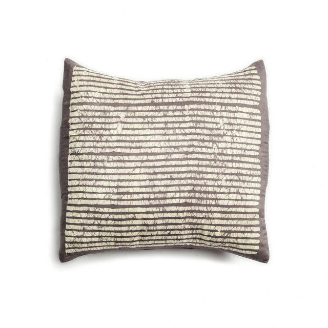 Maple black silk pillow is luxurious and exquisite with its unique wax block print created to enhance the space in between...
