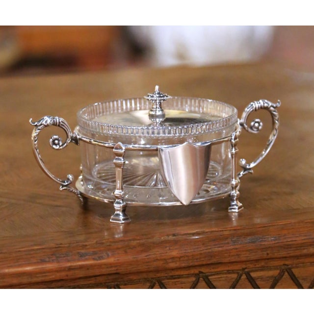 Crafted in France circa 1890, this elegant antique covered sugar bowl features a removable cut-crystal insert held within...