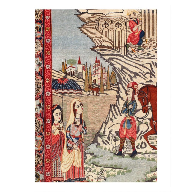 A lush array of , Scenery , across the soft beige field of this classically elegant antique Kashan. A striking and unusual...