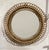 An elegant circular wall mirror, attributed to mid-century Italian design (inspired by the designs of Franco Albini and...