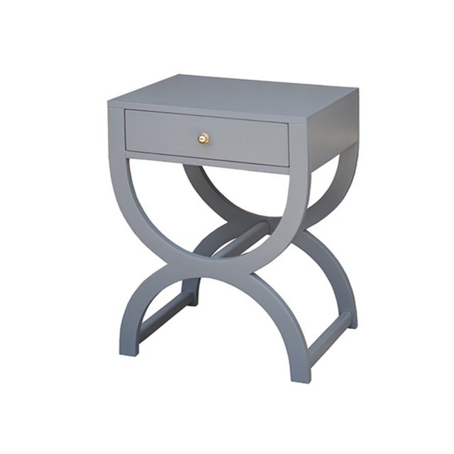 New special order item. Not vintage. The graceful geometric legs on this one drawer side table complement a broad range of...