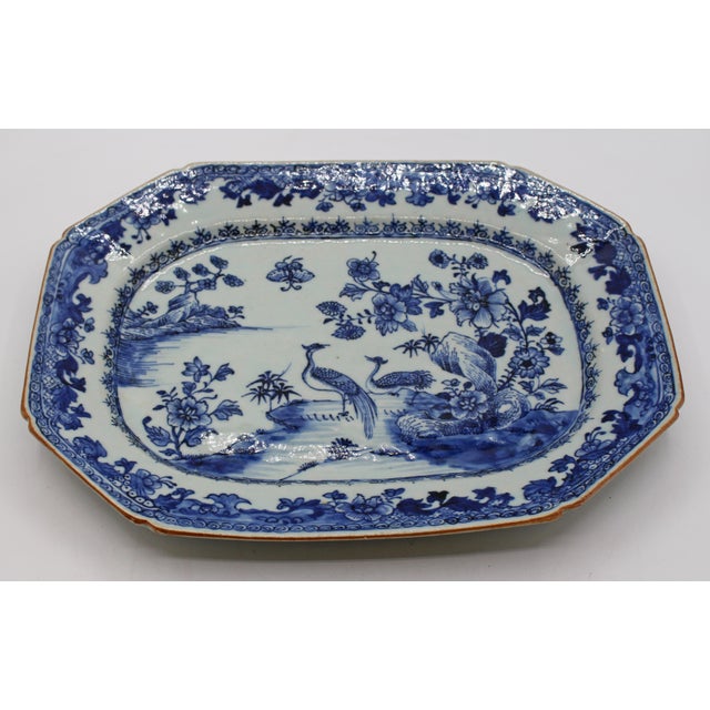 Early-mid 19th century Chinese export porcelain blue & white platter. Octagonal form with notched corners. Charming...