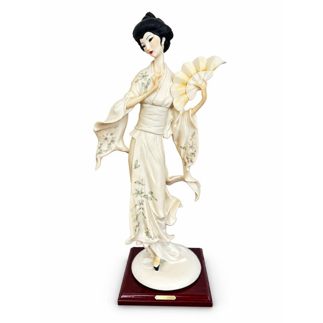 Elegant vintage porcelain figurine by Giuseppe Armani for Florence, titled “Oriental Lady With Fan,” Art. 0610-S. Made in...