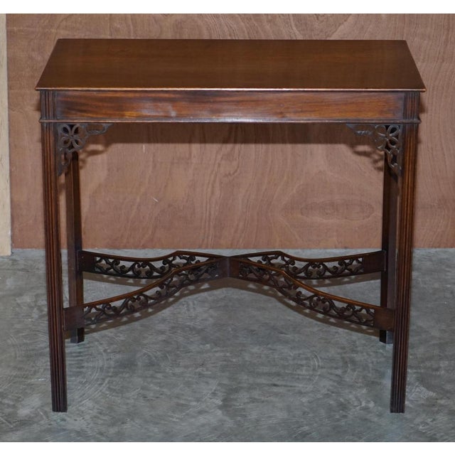 This is a very rare, restored, Thomas Chippendale style, Fret work carved, occasional silver tea table in Mahogany with...