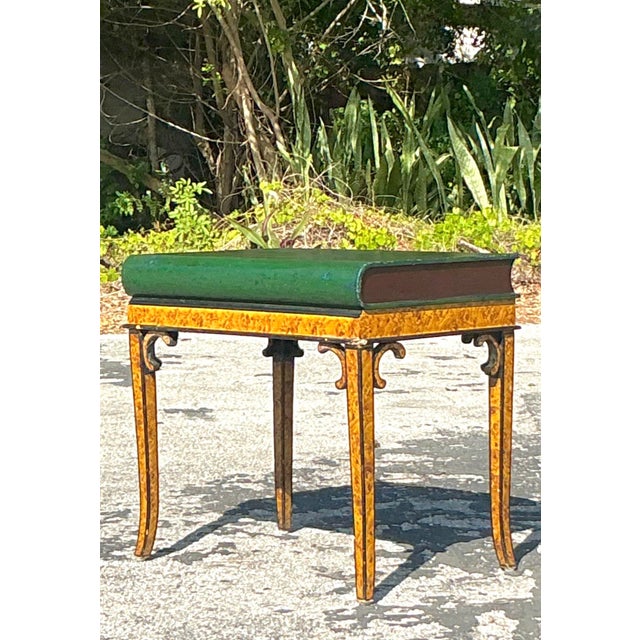 This whimsical vintage Regency side table is designed to resemble an oversized leather-bound book, making it a charming...