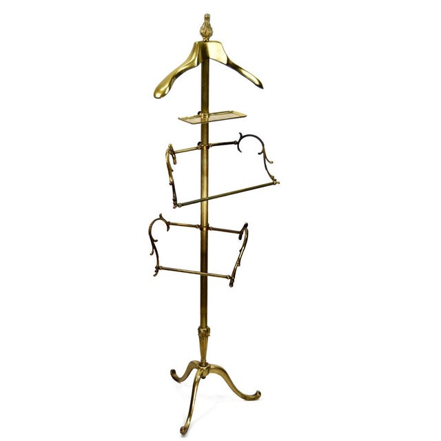 Valet stand, made in the mid-20th century. An exceptionally solid brass valet stand, an essential piece for the bedroom of...