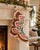 This one-of-a-kind Christmas stocking is hand-altered from an authentic vintage Turkish rug, hand-knotted in wool circa...