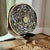 Vintage glass mosaic wall sconce candle holder featuring a beautiful mandala design. The intricate tilework features rich...