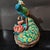 Art Deco 1. **Hand-Painted Ceramic Peacock Statue, Blue-Green-Yellow-Red Plumage, Floral Base** For Sale - Image 3 of 7