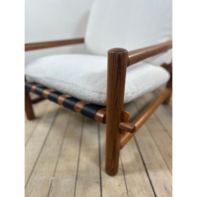 Vintage 1970s Lounge Chair in Solid Pine. Give your living room or outdoor space a unique Scandinavian/modernist look with...