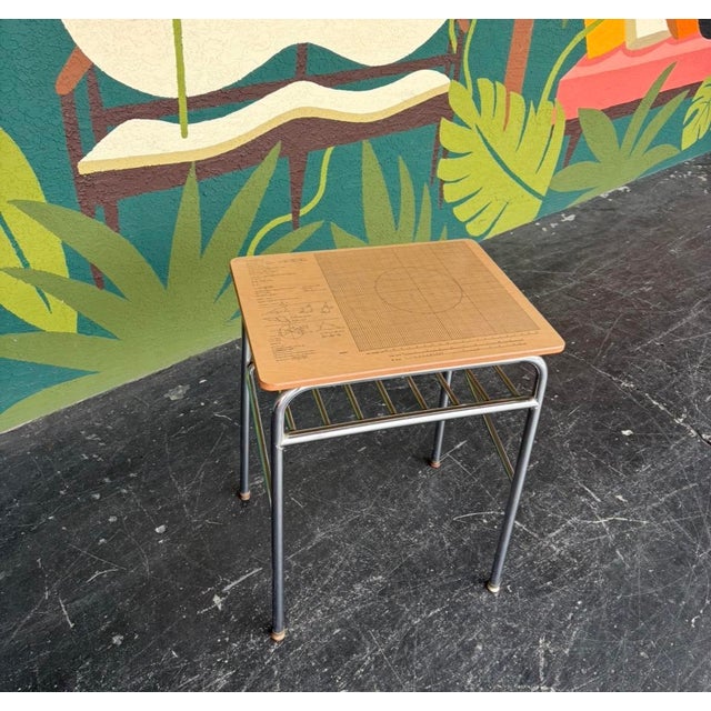 A truly unique school desk with great character. Produced by Columbia, comprised of a chrome frame and a durable laminate...