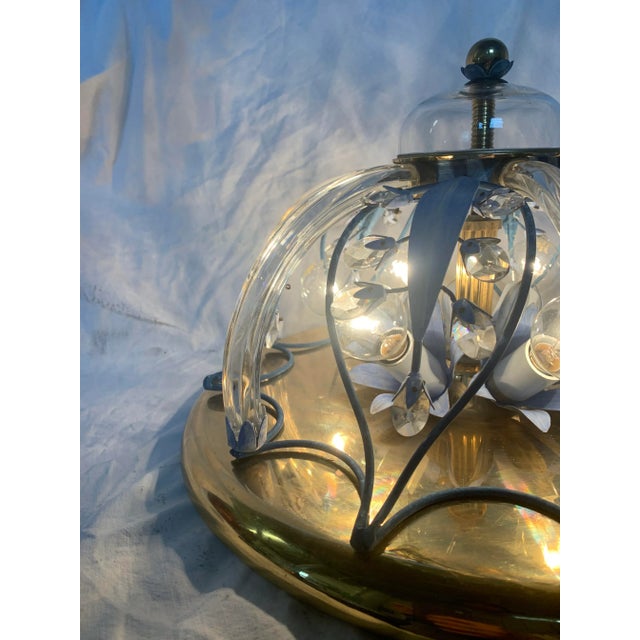 Fantastic 1970s ceiling light in murano glass, bearing structure in brass and iron. In good condition, of course, the...