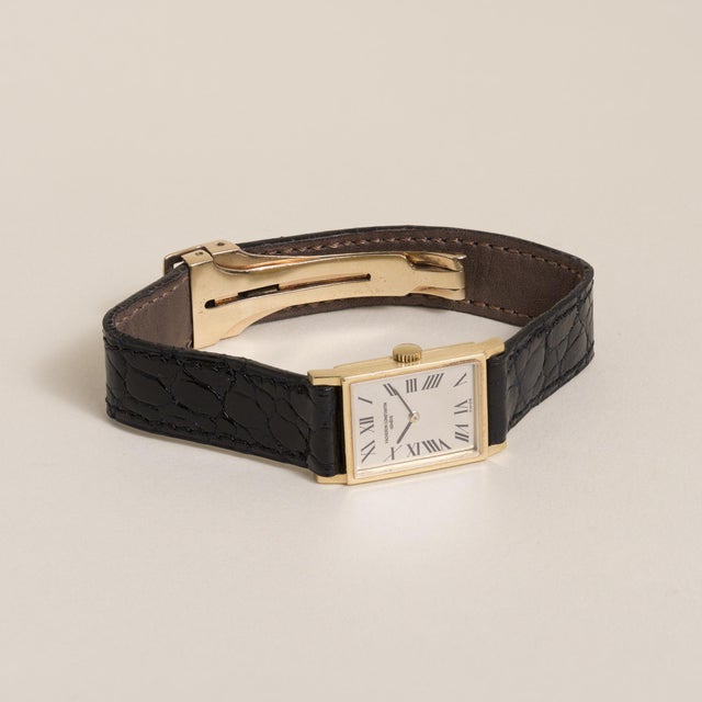 Vacheron Constantin Rectangular Dress Watch in Yellow Gold, circa 1960s–1970s. Featuring a slim rectangular yellow gold...