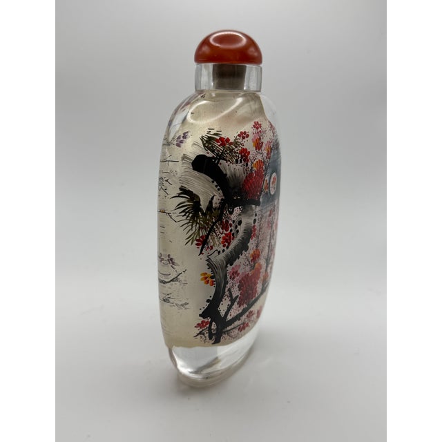 This is an oversize inside painted snuff bottle. Oversize snuff bottles are used to store large amounts of snuff. It can...