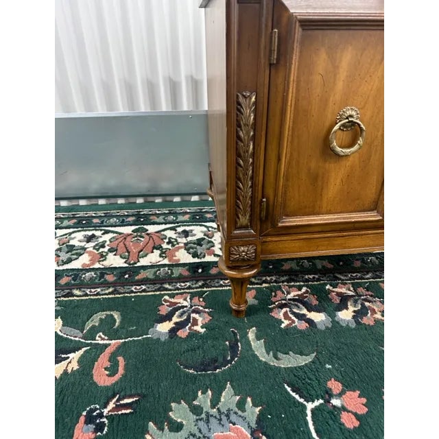 At the heart of your bedroom, the Vintage Fruitwood Nightstand stands as a testament to quality craftsmanship....