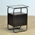 Iron nightstand with a glass top from circa 1920, originating from a hospital. The cabinet has been completely stripped of...
