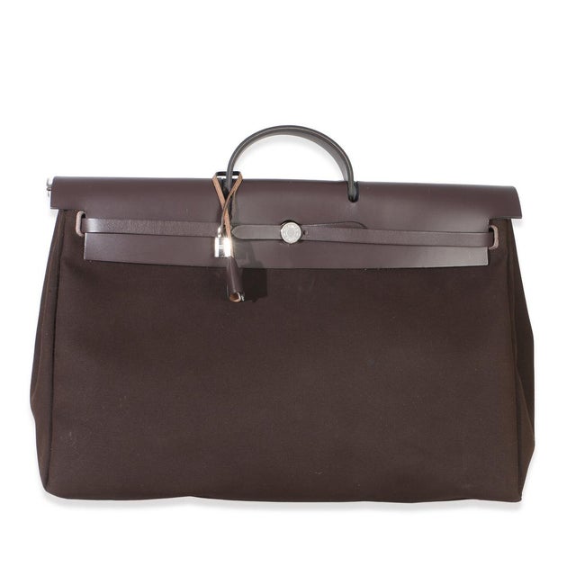 Item #: 154862 Exterior Material: Canvas MSRP: 5,200 Interior Material: Canvas Dimensions: 19 x 14.24 x 8 in Handbag...