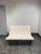Design Plus Gallery presents a James Loveseat from Williams-Sonoma. This compact loveseat has a tufted white leather with...