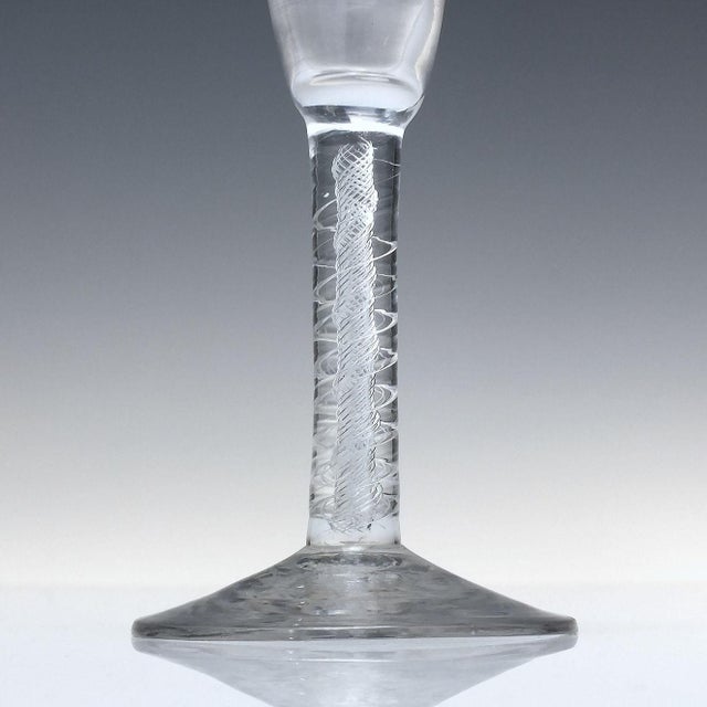 A superb 18th century Air Twist wine glass which used to be contained with the Ron and Mary Thomas collection dating to...