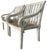 A character-rich pair of solid wood garden armchairs featuring gracefully scrolled arms and a gently curved front rail....