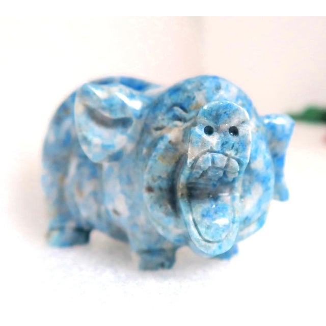 This is another one of a collection of miniature semi-precious and precious stone carvings we purchased from a retired...
