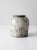 This is a vintage studio pottery vase. Shaped as a ginger jar, the handmade vase has a beautiful gray and white glaze.