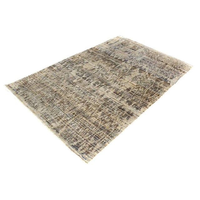 Modern hand knotted rug made with luxurious wool is a refreshing addition to your décor. Mesmerizing Intricacy and...