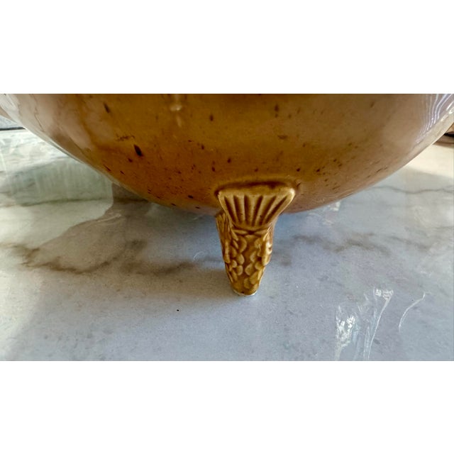 Vintage Majolica Coastal Scallop Shell Centerpiece Bowl with Figural Fish Feet Bring a touch of classic coastal elegance...