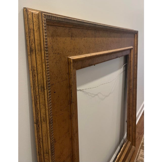 This is a large (36” x 36” opening; 54” x 54” overall) vintage square gilt wood picture frame featuring a wide, flat-...