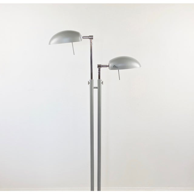 An elegant, two-light vintage floor lamp, model go226 "jelken," from ikea, dating from the late 1990s or early 2000s. a...