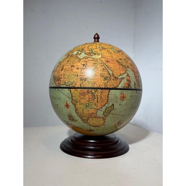 Elegant and timeless globe bar by Zoffoli, combining classic cartography with practical storage. This beautifully crafted...