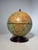Elegant and timeless globe bar by Zoffoli, combining classic cartography with practical storage. This beautifully crafted...