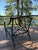 A vintage American indoor/outdoor club chair with branching tree limb motif, just like the ones seen in last summer's...