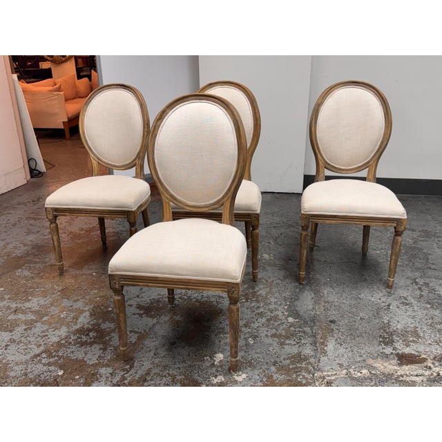 Design Plus Gallery presents a Set of Four French Dining Chairs designed by Van Thiels for Restoration Hardware. Drawing...