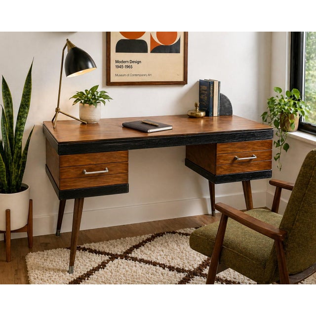 This vintage mid-century modern desk showcases classic design elements associated with late 1950s–early 1960s production,...