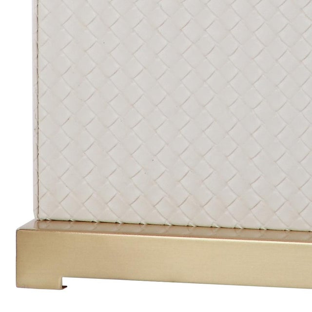 Designed to evoke the deco style of New York’s Chrysler building, this modern table lamp brings élan to any contemporary...