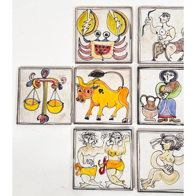 A set of eleven glazed terra cotta tiles, ca. 1960s, by the Sicilian ceramicist Giovanni DeSimone (1930-1991). Each of...