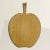 A quaint early 20th century English maple apple cutting board perfect for chopping fruits and veggies, or serving...