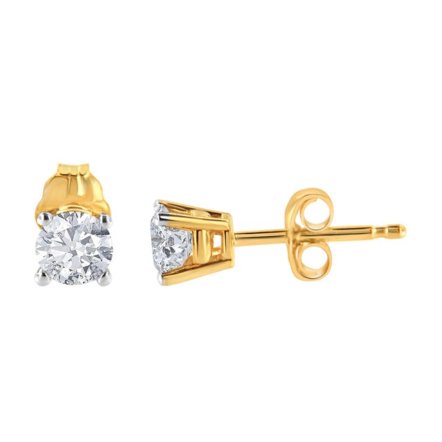 You can never go wrong with these classic 14k yellow gold stud earrings. Each earring features a 4 prong set round cut...