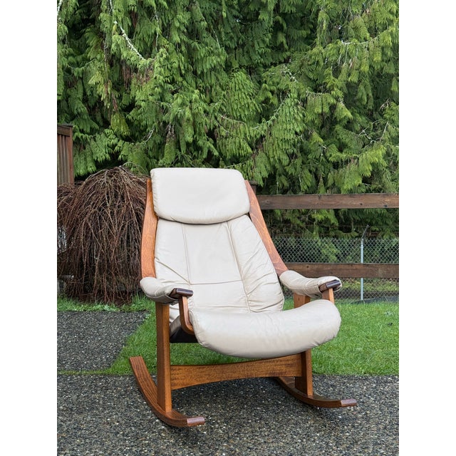 Vintage Scandinavian Leather Rocking Chair This chair is unmarked This vintage Scandinavian rocking lounge chair is the...