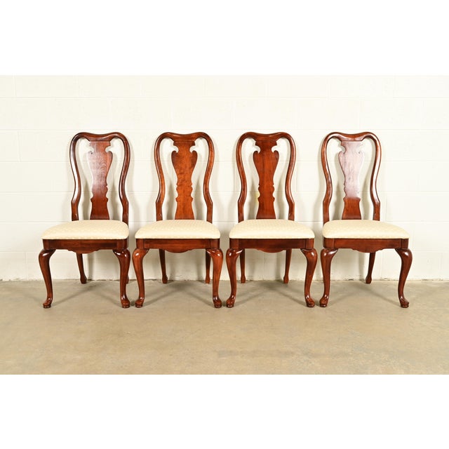 A gorgeous set of four Queen Anne or Georgian style dining chairs By Thomasville USA, Circa 1980s Solid carved mahogany...