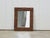 A French rectangular Tramp Art hand carved wooden mirror from the early 20th century, with raised diamond motifs and X...