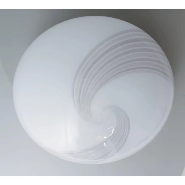 Vintage Italian flush mount or wall light with a single milky white Murano glass shade decorated with ribbed spirals /...