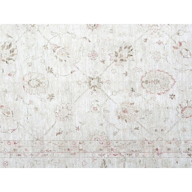 This pristine vintage Afghan Peshawar rug measures 11'10" x 17'8". Made of cotton on wool, it's a beautiful piece with...