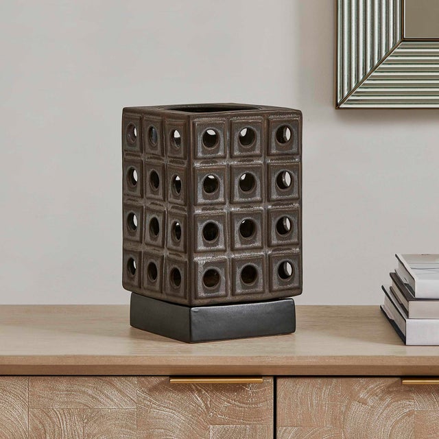 This Sculptural Earthenware Candle Holder Features A Unique Design With A Modern, Architectural Design, Finished With A...