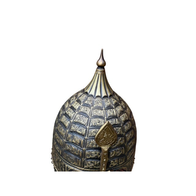 Hand Made Helm: Centuries of tradition echo through the heavy brass of spiritual armor. More than a simple defense...