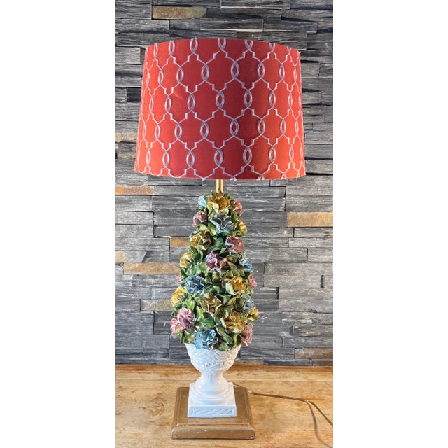 Mid-century Capodimonte handcrafted and hand painted porcelain topiary table lamp adorned with detailed yellow, blue, and...