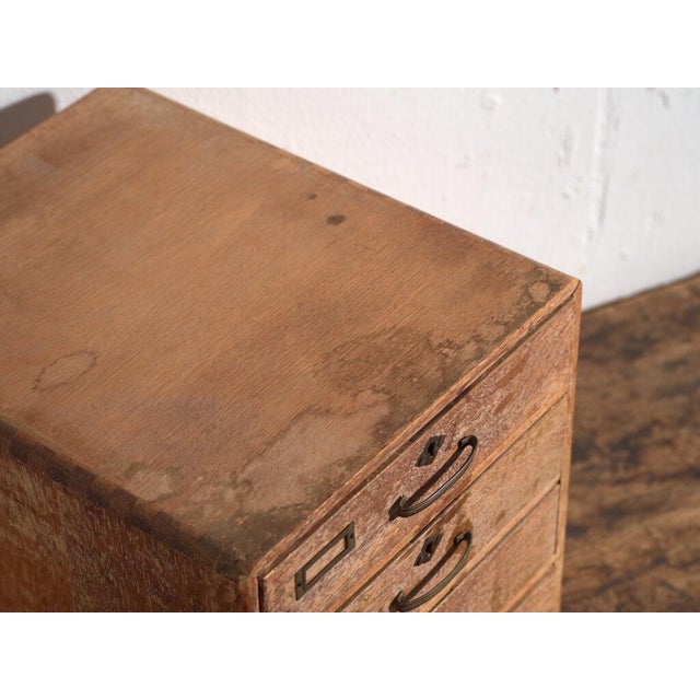 Small Japanese desk drawer cabinet with four drawers made from Japanese oak (Quercus spp.) and Japanese red pine (Pinus...