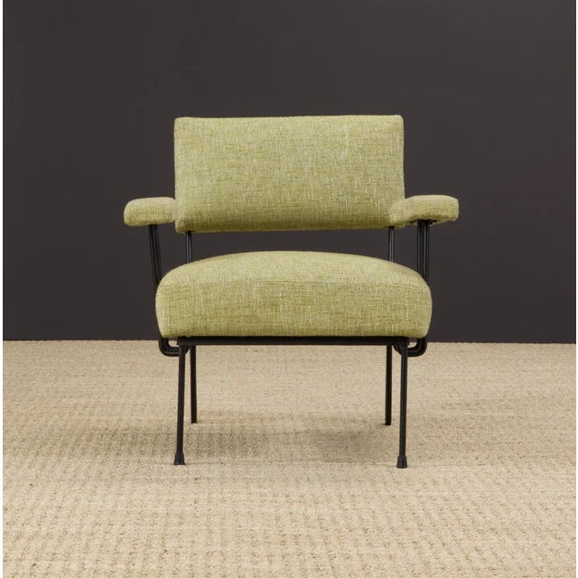 Striking mid-century modern armchair attributed to Dan Johnson for Pacific Iron, featuring a sculptural black iron rod...