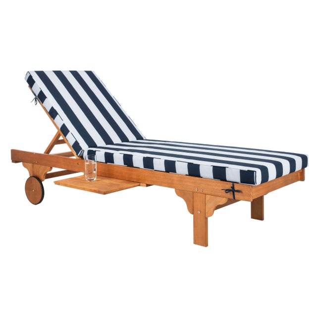 A fresh update of a of a English garden classic, the outdoor chaise lounge chair recalls the manicured landscapes of Rhode...